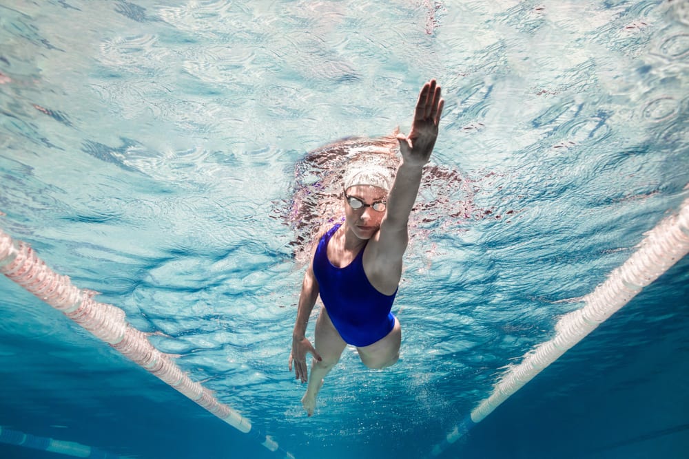 Best Swimming Benefits - It improves strength and definition